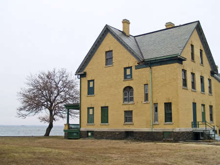 A turn of the 20th century yellow brick home was part of the Barracks of Fort Hancockの写真素材
