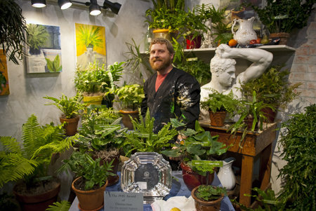 PHILADELPHIA - MARCH 12:  Artist Albert G.Aldinger with his display at the international Flower Show in Philadelphia Pa on March 12, 2011.のeditorial素材