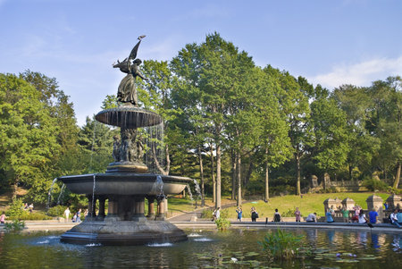 NEW YORK - SEPTEMBER 24: New Yorkers and tourists enjoy a beautiful Summer day around the Bethesda...