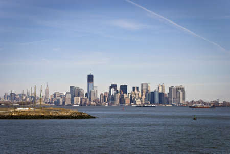 A view from across the Hudson River in Bayonne of lower Manhattan with the Freedom Tower under construction のeditorial素材