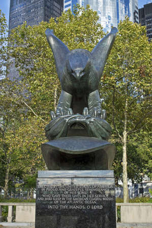 "Navy Memorial Eagle Battery Park"  NEW YORK - SEPTEMBER 24: The US Navy Memorial Eagle in Battery Park and surrounding modern architecture of lower Manhattan on September 24,2012.のeditorial素材