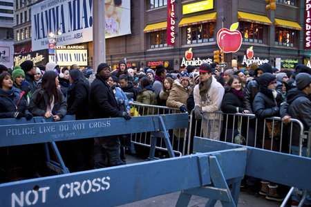 NEW YORK - DECEMBER 31: Crowds gather in Times square on New Years Eve, December 31, 2012 in New...
