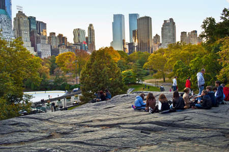 NEW YORK - OCTOBER 29  People relaxing on the rocks with a nice view in Central Park on October 29 2013 in New York City  Central park is a 778 acre public park in the middle of Manhattan のeditorial素材