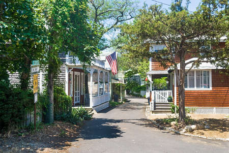 OAK BLUFFS, MASSACHUSETTS USA - June 26  Narrow streets and quaint cottages in Oak Bluffs on June 26, 2011  Oak Bluffs on Marthaâs Vineyard is popular for the historic gingerbread style homes located there のeditorial素材