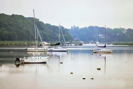 HYANNIS PORT, MASSACHUSETTS USA - June 27  Early morning mist at this marina on June 27, 2011  Hyannis Port is an affluent summer community on Hyannis Harbor in Cape Cod のeditorial素材