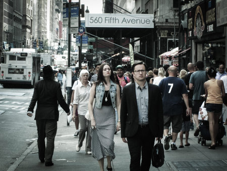 NEW YORK-AUGUST 14  Ordinary people walk along Fifth Ave on August 14 2013 in Manhattan  Fifth Ave...