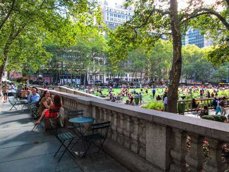 NEW YORK-AUGUST 14  People relax on a nice day in Bryant Park on August 14  2013 in Manhattan  Bryant Park is a popular tourist destination in midtown Manhattan のeditorial素材