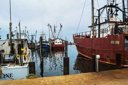 BARNEGAT LIGHT, NEW JERSEY USA â JULY 19  Commercial fishing boats at a marina in Barnegat Light New Jersey on July 19, 2014 のeditorial素材