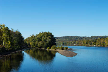 A scenic view of the Delaware river in early Autumn near Washington Crossing State Park.の写真素材