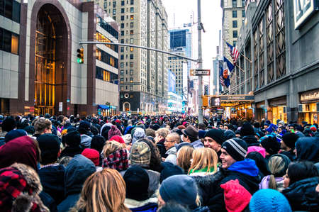 NEW YORK-DECEMBER 31: Large crowd gathers hours before the New Years Eve celebration in Times Square on December 31, 2013 in Manhattan.のeditorial素材