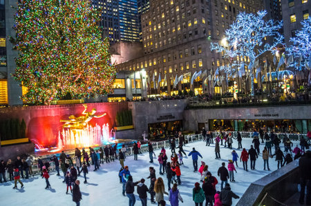 NEW YORK-DECEMBER 12: Ice skaters on the rink at  Rockefeller Center by the world famous Christmas...