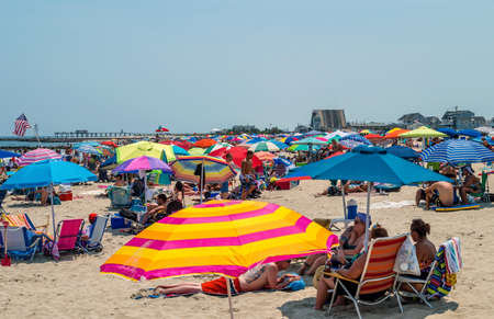 BELMAR, NEW JERSEY-JULY 7 - A sea of umbrellas on this crowded beach on July 7 14 2012 in Belmar New Jersey.のeditorial素材