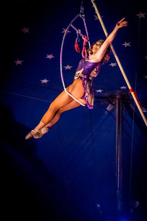 OLD BRIDGE, NEW JERSEY -JUNE 8 - An acrobatic lady on the swing at the Kelly Miller Circus on June 8 2015 in Old Bridge New Jersey.のeditorial素材