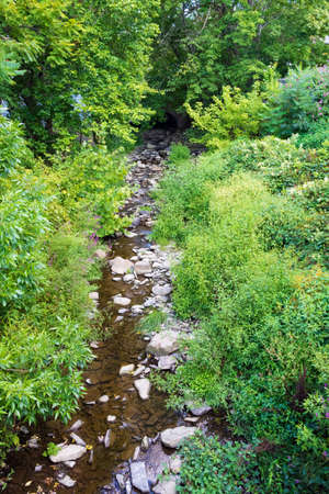A small stream running through private property in Lambertville NJ.の写真素材