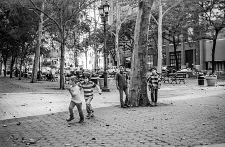 NEW YORK-OCTOBER 23: Four young boys playing in Dag Hammarskjold Plaza on October 23 2015 in Manhattan.のeditorial素材