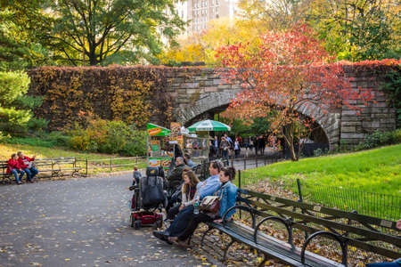 New York, NY, USA - October 29, 2012: People relaxing in Central Park on a beautiful Autumn day in New York City.のeditorial素材