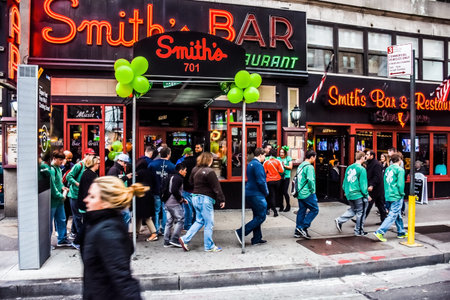 NEW YORK-MARCH 17- A busy sidewalk outside SmithÃ¢ï¿½ï¿½s Bar on St PatrickÃ¢ï¿½ï¿½s...