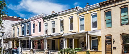 Colorfully painted row homes in Hampden a popular neighborhood in Baltimore.