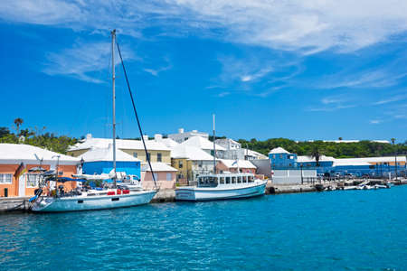 ST.GEORGE'S, BERMUDA, MAY 27 - Colorful buildings with white roofs,turquoise colored water and boats in the harbor on May 27 2016 in St. GeorgeÃ¢ï¿½ï¿½s Bermuda.のeditorial素材