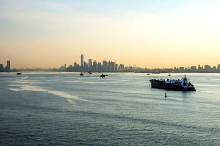 A hazy morning view of the New York Harbor.の写真素材