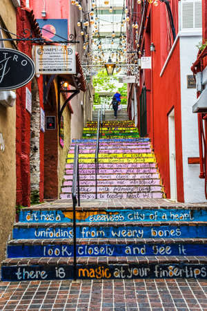 HAMILTON,BERMUDA, MAY 25 - Colorful steps with sayings in this alleyway on May 25 2016 in the city of Hamilton Bermuda.のeditorial素材