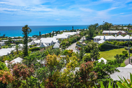 The white painted roofs on buildings of Bermuda are designed to save the rain for the home water supply.の写真素材