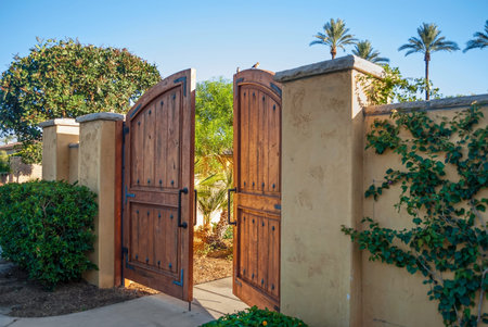 The garden wall and wooden door in Southern California.