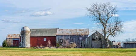 An old farm panoramic view as seen from a country road in rural Central New Jersey.の写真素材