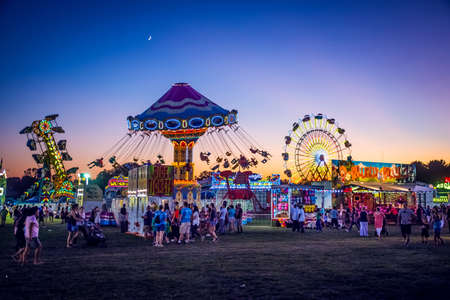 WEST WINDSOR, NEW JERSEY - September 23 - Amusement park rides and plenty of people attended The 18th Annual Mercer County Italian American Festival on September 23, 2017 in West Windsor NJ.のeditorial素材