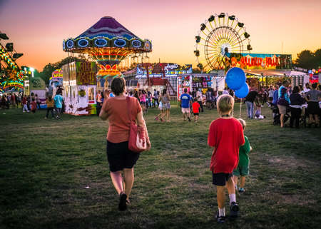 WEST WINDSOR, NEW JERSEY - September 23 - Amusement park rides and plenty of people attended The 18th Annual Mercer County Italian American Festival on September 23, 2017 in West Windsor NJ.のeditorial素材
