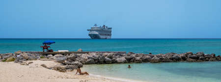 PRINCESS CAYS, BAHAMAS - JULY 8 - A peaceful beach scene panorama with cruise ship on July 8 2018 on the small island Princess Cays in the Bahamas.のeditorial素材