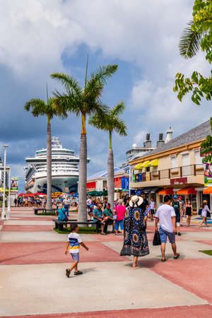 PHILLIPSBURG, ST. MAARTEN - JULY 11 - A colorful view of a tourist area with cruise ship in the background on July 11 2018 in Phillipsburg, St. Maarten.のeditorial素材