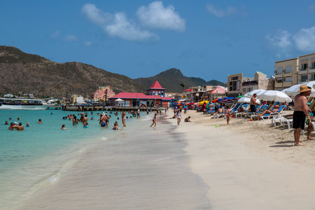 PHILLIPSBURG, ST. MAARTEN - JULY 11 - A scenic view of the beach and landscape and boardwalk buildings on July 11 2018 in Phillipsburg, St. Maarten.のeditorial素材