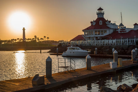 LONG BEACH, CALIFORNIA-JUNE 24: The The Parkers Lighthouse restaurant and Long Beach Lighthouse in the distance as seen on June 24 2009 in Long Beach California.のeditorial素材