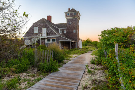 The abandoned US Life Saving Station in Sandy Hook National Recreation Area along the Jersey Shore.の写真素材