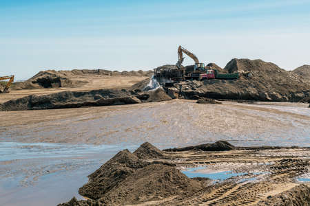 NOME, ALASKA - JUNE 8 - Open pit gold mining still active on June 8 2019 in Nome Alaska.のeditorial素材