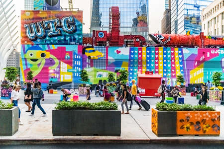 NEW YORK-October 9: Pedestrians in the colorful public square area by the World Trade Center on December 9 2018 in New York City.のeditorial素材