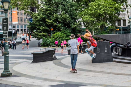 NEW YORK-June 20: A skateboarder takes off in Foley Square on June 20 2018 in New York City.のeditorial素材