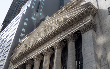A detailed look at the columns and Greek style sculpture of the new York Stock Exchange.