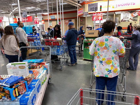 OLD BRIDGE, NEW JERSEY - March 13: Shoppers checking out during the Coronavirus scare during a visit...
