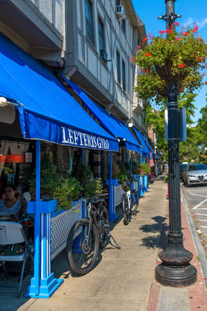 SLEEPY HOLLOW, NEW YORK - SEPTEMBER 18: Picturesque storefronts with outdoor dining on September 18 2021 in the village of Sleepy Hollow in New York state.のeditorial素材