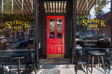 SLEEPY HOLLOW, NEW YORK - SEPTEMBER 18: The Setback Inn with vibrant red door on September 18 2021 in the village of Sleepy Hollow in New York state.のeditorial素材