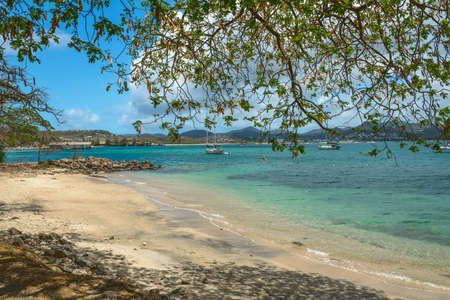 A quiet public beach on Pigeon Island in Saint Lucia.の写真素材
