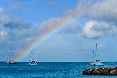 A morning rainbow over Rodney Bay on the island of Saint Lucia.の写真素材