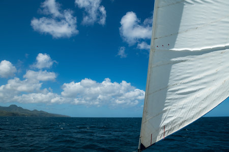 A white sail seascape and background image taken off the coast of Saint Lucia.
