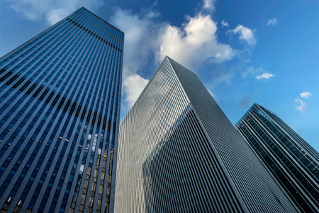 Looking up at midtown Manhattan skyscrapers built during the 1970's.の写真素材