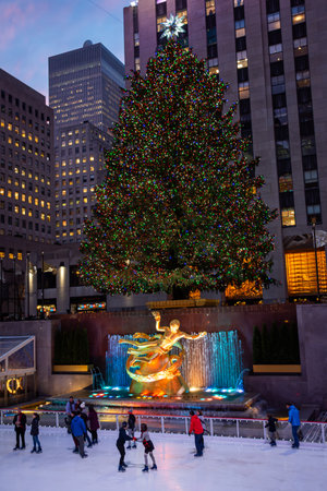 NEW YORK-DECEMBER 7: Ice skaters in front of the Rockefeller Center Christmas tree on December 7 2015 in midtown Manhattan.のeditorial素材