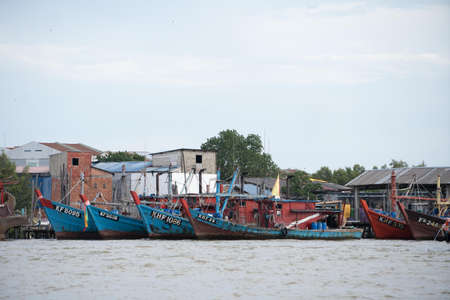 Kedah,Malaysia - 11-05-2019 : the wooden fisherman boat parking at the pier when finish the harvesting activity.のeditorial素材