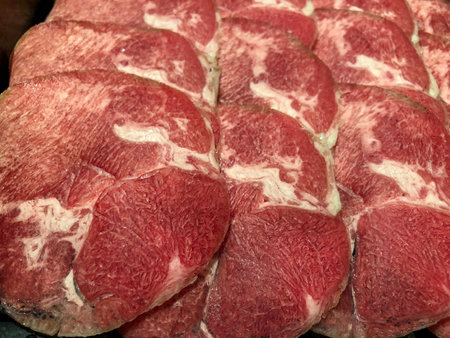Close to frozen sliced cowâ€™s tongue, thinly sliced to boiled (Shabu, sukiyaki) in hot pot or...