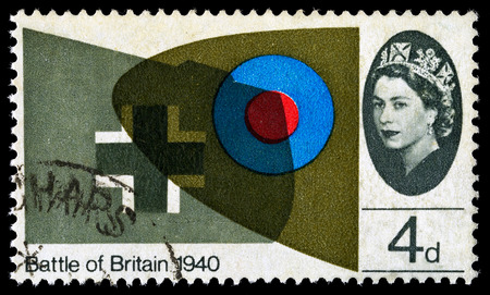 UNITED KINGDOM - CIRCA 1965: A used postage stamp printed in Britain celebrating the 25th Anniversary of the Battle of Britain showing the Wingtips of a Supermarine Spitfire and Messerschmitt, circa 1965のeditorial素材